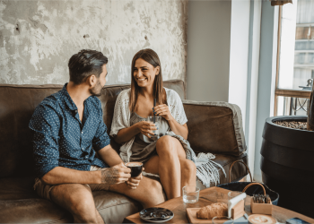 Couple enjoying coffee together, representing Dating While Going Through a Divorce and starting fresh.